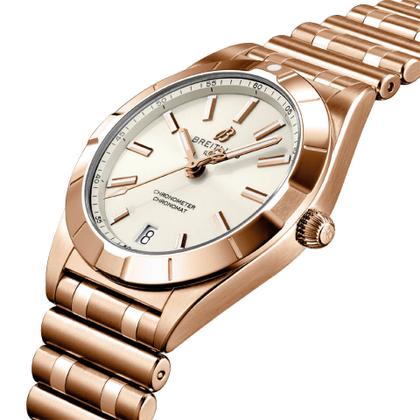 Breitling Chronomat 32 Quarz Rotgold weißes Zifferblatt Metallband – Damenuhren Uhr mit Datum aus 750 Rotgold. Das Gehäuse ist rund und roségold. Das Goldarmband ist roségold. Das Zifferblatt ist ein Index in weiß. – Ansicht 3