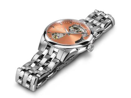 Hamilton Jazzmaster Open Heart Lady Automatik Edelstahl 36mm apricotfarbenes Zifferblatt Metalband – Damenuhren Uhr ohne Datum aus Edelstahl. Das Gehäuse ist rund und silber. Das Edelstahlarmband ist silber. Das Zifferblatt ist ein Index in orange. – Ansicht 3