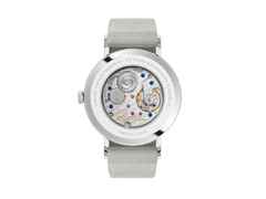 Nomos Glashütte Tangente 38 Datum "175 Years Watchmaking - Pastell" Handaufzug Edelstahl korallfarbenes Zifferblatt graues Textilband Glasboden – Herrenuhren Uhr mit Datum aus Edelstahl. Das Gehäuse ist rund und silber. Das Textilarmband ist grau. Das Zifferblatt ist arabisch Index und orange. – Ansicht 2