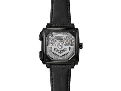 TAG Heuer Monaco Evergraph Automatik Titan DLC-Schwarz 40mm skelettiertes Zifferblatt schwarzes Kautschukband – Herrenuhren Chronograph aus DLC beschichtet und Titan. Das Gehäuse ist quadratisch und schwarz. Das Kautschuk / Kunststoff / Silikon Armband ist schwarz. Das Zifferblatt ist ein Index in schwarz. – Ansicht 2