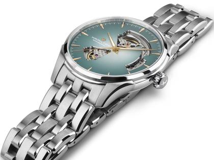 Hamilton Jazzmaster Open Heart Automatik Edelstahl 40mm hellblaues Zifferblatt Metallband – Herrenuhren Uhr ohne Datum aus Edelstahl. Das Gehäuse ist rund und silber. Das Edelstahlarmband ist silber. Das Zifferblatt ist ein Index in blau. – Ansicht 2