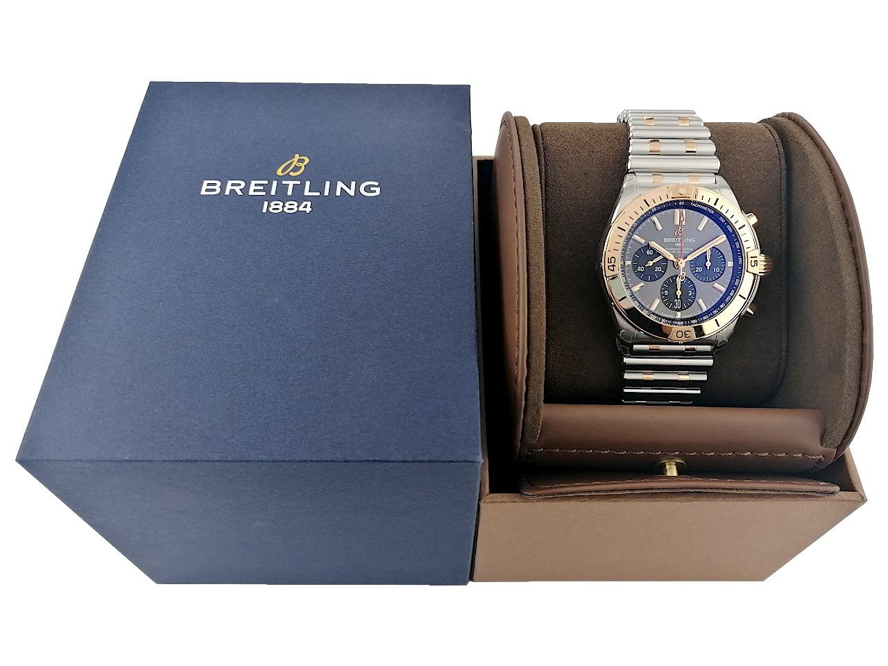 Breitling Chronomat B01 Automatik Edelstahl 42mm graues Zifferblatt Metallband UB0134101B1U1 Full Set Occasion Refurbished – Herrenuhren Chronograph aus 750 Rotgold und Edelstahl. Das Gehäuse ist rund und silber-rotgold. Das Edelstahlarmband mit Gold ist silber-rotgold. Das Zifferblatt ist ein Index in grau. – Ansicht 5