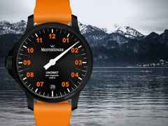 MeisterSinger Unomat Automatik Edelstahl 43mm schwarzes Zifferblatt orangefarbenes Kautschukband limitiert – Herrenuhren Uhr mit Datum aus DLC beschichtet, Edelstahl und Kautschuk. Das Gehäuse ist rund und schwarz. Das Kautschuk / Kunststoff / Silikon Armband ist orange. Das Zifferblatt ist arabisch Index und schwarz. – Ansicht 2
