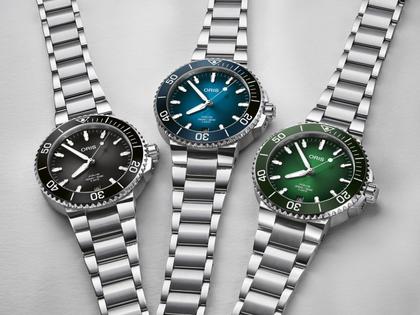 Oris Aquis Date Calibre 400 Automatik Edelstahl 41,5mm grünes Zifferblatt Metallband – Herrenuhren Uhr mit Datum aus Edelstahl. Das Gehäuse ist rund und silber. Das Edelstahlarmband ist silber. Das Zifferblatt ist ein Index in grün. – Ansicht 7