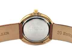 Glashütte Original GUB Glashütte Spezimatic "Ufo" Messing vergoldet 42mm Lederband Kaliber 75 Occasion Refurbished – Herrenuhren Uhr mit Datum aus Messing. Das Gehäuse ist rund und gelbgold. Das Lederarmband ist braun. Das Zifferblatt ist ein Index in braun. – Ansicht 2
