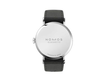 Nomos Glashütte Tangente 35 neomatik Platingrau Automatik Edelstahl 35mm graues Zifferblatt schwarzes Lederband Stahlboden – Damenuhren Uhr ohne Datum aus Edelstahl. Das Gehäuse ist rund und silber. Das Lederarmband ist schwarz. Das Zifferblatt ist arabisch Index und silber. – Ansicht 2