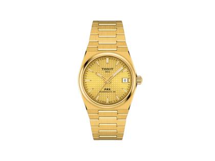 Tissot PRX Automatik Edelstahl Gelbgold-PVD 35mm goldfarbenes Zifferblatt Metallband – Damenuhren Uhr mit Datum aus Edelstahl, PVD beschichtet und vergoldet. Das Gehäuse ist rund und gelbgold. Das Edelstahlarmband ist gelbgold. Das Zifferblatt ist ein Index in gelbgold.