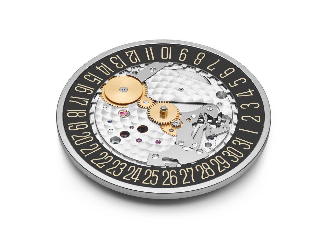 Nomos Glashütte Tangente 38 Datum "175 Years Watchmaking - Tiefseegrau" Handaufzug Edelstahl schwarzes Zifferblatt graues Textilband Glasboden – Herrenuhren Uhr mit Datum aus Edelstahl. Das Gehäuse ist rund und silber. Das Textilarmband ist grau. Das Zifferblatt ist arabisch Index und schwarz. – Ansicht 6