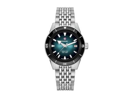 Rado Captain Cook Automatik Edelstahl 39mm türkises Zifferblatt Metallband – Herrenuhren Uhr mit Datum aus Edelstahl und Keramik. Das Gehäuse ist rund und silber. Das Edelstahlarmband ist silber. Das Zifferblatt ist ein Index in türkis.