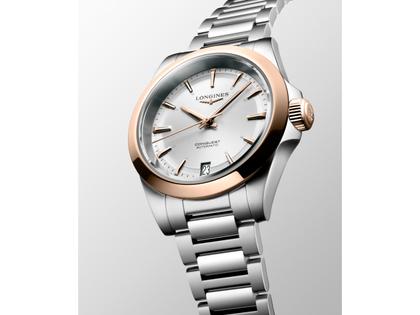 Longines Conquest Automatik Edelstahl 34mm silberfarbenes Zifferblatt Metallband – Damenuhren Uhr mit Datum aus 750 Rotgold und Edelstahl. Das Gehäuse ist rund und silber. Das Edelstahlarmband ist silber. Das Zifferblatt ist ein Index in silber. – Ansicht 2