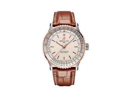 Breitling Navitimer Automatic 41 Chronometer Edelstahl cremefarbenes Zifferblatt braunes Lederband – Herrenuhren Uhr ohne Datum aus 750 Rotgold und Edelstahl. Das Gehäuse ist rund und silber-rotgold. Das Lederarmband Kroko / Alligator ist braun. Das Zifferblatt ist ein Index in beige.