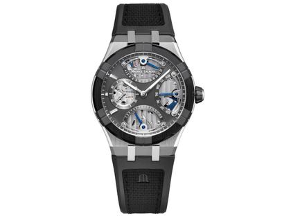 Maurice Lacroix Aikonic Master Triple Retrograde Automatik Edelstahl 43mm skelettiertes Zifferblatt schwarzes Kautschukband Limited Edition – Herrenuhren Uhr mit Datum aus Edelstahl, Kautschuk, Keramik und Leder. Das Gehäuse ist rund und silber. Das Kautschuk / Kunststoff / Silikon Armband ist schwarz. Das Zifferblatt ist skelettiert und schwarz.