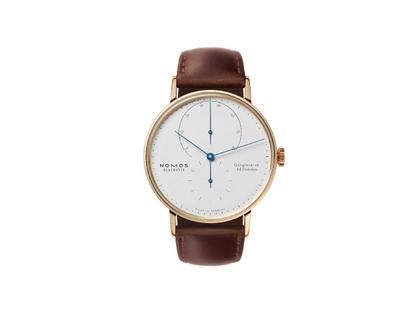 Nomos Glashütte Lambda 39 Handaufzug Roségold 39mm weißes Zifferblatt braunes Lederband – Herrenuhren Uhr ohne Datum aus 750 Rotgold und Leder. Das Gehäuse ist rund und roségold. Das Lederarmband ist braun. Das Zifferblatt ist ein Index in weiß.