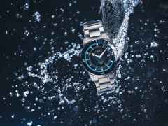 Mühle Glashütte Sportivo Travel GMT Automatik Edelstahl 42,5mm schwarzes Zifferblatt Metallband – Herrenuhren Uhr mit Datum aus Edelstahl und Keramik. Das Gehäuse ist rund und silber. Das Edelstahlarmband ist silber. Das Zifferblatt ist arabisch Index und schwarz. – Ansicht 4
