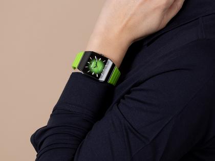 Rado Anatom Automatik Keramik 32,5mm schwarz-grünes Zifferblatt grünes Kautschukband – Damenuhren Uhr mit Datum aus Edelstahl, Kautschuk, Keramik und PVD beschichtet. Das Gehäuse ist rechteckig und schwarz. Das Kautschuk / Kunststoff / Silikon Armband ist grün. Das Zifferblatt ist ein Index in grün. – Ansicht 8