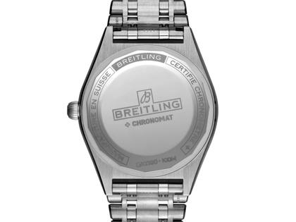 Breitling Chronomat Automatic 36 Edelstahl blaues Zifferblatt mit Brillanten zweifarbiges Metallband – Damenuhren Uhr mit Datum aus 750 Weißgold, Edelstahl und Kautschuk. Das Gehäuse ist rund und silber. Das Edelstahlarmband mit Gold ist schwarz. Das Zifferblatt ist ein Index in blau. – Ansicht 3