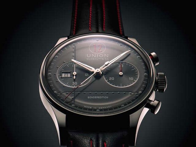 Union Glashütte Noramis Chronograph Paul Pietsch Sonderedition Automatik Edelstahl 42mm schwarzes Zifferblatt schwarzes Lederband – Herrenuhren Chronograph aus Edelstahl. Das Gehäuse ist rund und silber. Das Lederarmband ist schwarz. Das Zifferblatt ist arabisch Index und schwarz. – Ansicht 2
