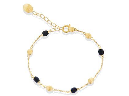 Nanis Dancing in the Rain Mystery Black Armband Gelbgold Onyx – Armschmuck Armband aus 750 Gelbgold.