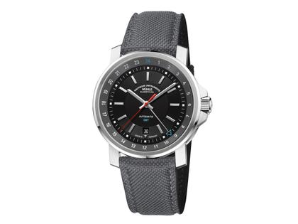 Mühle Glashütte 29er Big GMT Automatik Edelstahl 42mm schwarzes Zifferblatt graues Textilband – Herrenuhren Uhr mit Datum aus Edelstahl. Das Gehäuse ist rund und silber. Das Textilarmband ist grau. Das Zifferblatt ist ein Index in schwarz.