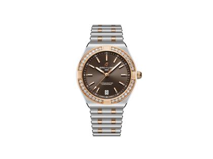 Breitling Chronomat 36 Automatik Edelstahl braunes Zifferblatt mit Brillanten Metallband – Damenuhren Uhr mit Datum aus 750 Rotgold und Edelstahl. Das Gehäuse ist rund und silber. Das Edelstahlarmband ist silber-roségold. Das Zifferblatt ist ein Index in braun.