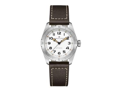 Hamilton Khaki Field Expedition Automatik Edelstahl 37mm weißes Zifferblatt braunes Lederband – Herrenuhren Uhr ohne Datum aus Edelstahl und Leder. Das Gehäuse ist rund und silber. Das Edelstahlarmband ist braun. Das Zifferblatt ist arabisch und weiß.