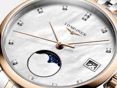 Longines Elegant Collection Quarz Edelstahl 30mm weißes Perlmutt-Zifferblatt zweifarbiges Metallband – Damenuhren Uhr mit Datum aus 750 Gelbgold, Edelstahl und vergoldet. Das Gehäuse ist rund und silber. Das Edelstahlarmband mit Gold ist silber-roségold. Das Zifferblatt ist ein Index in weiß. – Ansicht 4