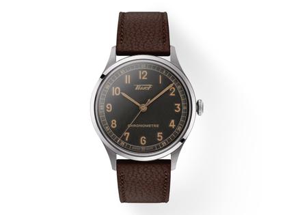 Tissot Heritage 1938 COSC Automatic Edelstahl 39mm anthrazites Zifferblatt braunes Lederband – Herrenuhren Uhr ohne Datum aus Edelstahl und Leder. Das Gehäuse ist rund und silber. Das Lederarmband ist braun. Das Zifferblatt ist arabisch und grau.