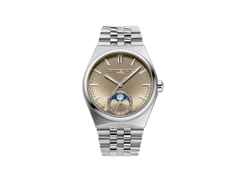Frederique Constant Highlife Moonphase Date Manufacture Automatik Edelstahl 39mm beiges Zifferblatt Metallband und blaues Lederband – Herrenuhren Uhr mit Datum aus Edelstahl und Leder. Das Gehäuse ist rund und silber. Das Edelstahlarmband ist silber. Das Zifferblatt ist ein Index in beige.
