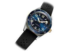 Glashütte Original SeaQ Automatik Edelstahl 40mm blaues Zifferblatt schwarzes Kautschukband – Herrenuhren Uhr mit Datum aus 750 Gelbgold, Edelstahl und Keramik. Das Gehäuse ist rund und silber-gelbgold. Das Kautschuk / Kunststoff / Silikon Armband ist blau. Das Zifferblatt ist arabisch Index und blau. – Ansicht 2